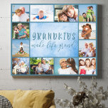 Toile Petits-enfants font la vie Grand Stylish Blue 12 P<br><div class="desc">Toile photo bleu enveloppé avec belle citation petits-enfants. Le modèle photo est prêt pour vous à télécharger 12 de vos photos préférées qui sont affichées comme une bordure autour des grands-parents disant. Le texte dit "Les petits-enfants font la vie grand" en lettres manuscrites, en majuscules décalées et en typographie de...</div>
