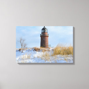 Toile Phare de Sturdy sur une côte rocheuse en hiver