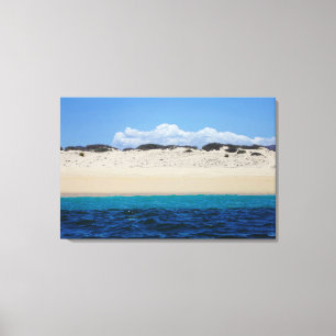 Toile Ressacs sur la plage sablonneuse sous le ciel bleu