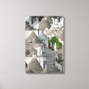 Toile Rue avec maisons trulli à Alberobello, Pouilles