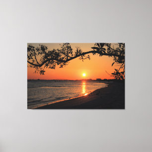 Toile Silhouette du coucher de soleil avec branche d'arb
