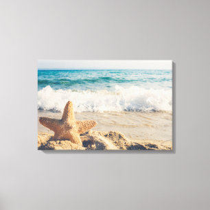 Toile Starfish sur une plage de sable Photo