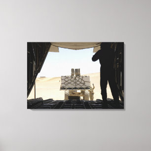 Toile Un chariot élévateur transporte du fret sur un Her