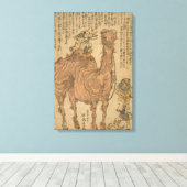 Toile Un homme joue au triangle sur un chameau (Insitu (Plancher de Bois))