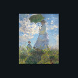 Toile Une femme avec un parasol par Claude Monet<br><div class="desc">Femme avec un Parasol - Madame Monet et Son Fils de Claude Monet, huile sur toile 1875, est un tableau d'une femme en robe blanche tenant un parapluie sur la tête sur le sommet d'une colline couverte d'herbe et de fleurs sauvages, rétroéclairé contre un ciel bleu brillant et des nuages...</div>