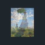 Toile Une femme avec un parasol par Claude Monet<br><div class="desc">Femme avec un Parasol - Madame Monet et Son Fils de Claude Monet, huile sur toile 1875, est un tableau d'une femme en robe blanche tenant un parapluie sur la tête sur le sommet d'une colline couverte d'herbe et de fleurs sauvages, rétroéclairé contre un ciel bleu brillant et des nuages...</div>
