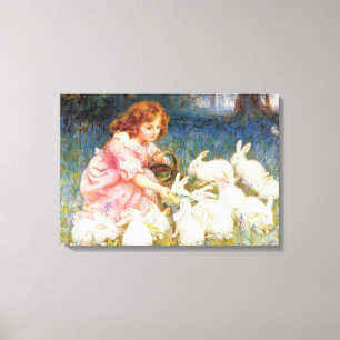 Toile Une fille nourrit les lapins (par Frederick Morgan