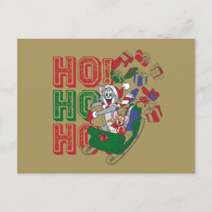 Tom en Jerry die geschenken in een hol leveren Feestdagenkaart