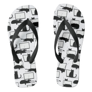 Tongs Chats noirs assis sur des ordinateurs portables Mo