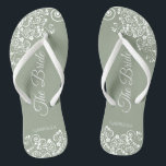 Tongs Dentelle blanche sur Sage Green La mariée Mariage<br><div class="desc">Dansez la nuit avec ces belles tongs mariages. Conçus pour la mariée, ils présentent un design simple mais élégant avec des lettres de script fantaisie sur un arrière - plan vert sage et des boucles et tourbillons en dentelle blanche. Belle façon de rester chic et approprié tout en donnant à...</div>