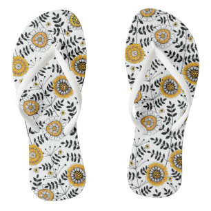 Tongs Fleurs de gribouillis et feuilles en jaune et noir