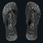 Tongs Lacy Silver sur Black Elegant Le Mariage de mariée<br><div class="desc">Dansez la nuit avec ces belles tongs mariages. Conçues pour la mariée, elles présentent un design sobre mais élégant avec des lettres en écriture grise sur un arrière - plan noir classique et des boucles et des tourbillons décoratifs gris argent fantaisie. Belle façon de rester chic et approprié tout en...</div>