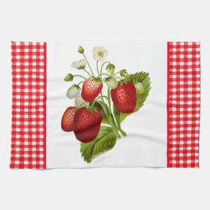 Torchon de cuisine à carreaux rouges avec des frai