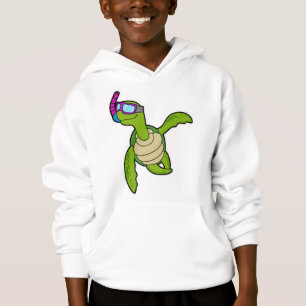Tortue à la natation avec tuba