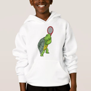Tortue au Tennis avec raquette de tennis