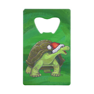 Tortue dans le casquette de Père Noël sur le ver