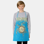 Tortue dorée sur tablier bleu (Porté)