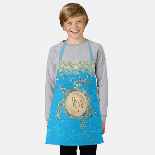 Tortue dorée sur tablier bleu (Porté)