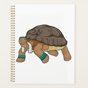 Tortue en coureur avec serviette