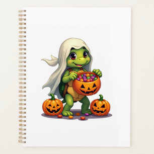 Tortue fantôme mignonne d'Halloween avec des bonbo