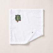 Tortue verte sur serviette de bain blanche (Gant de toilette)