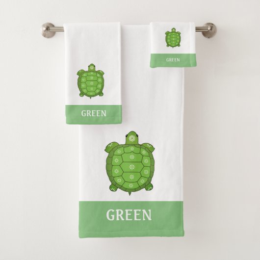Tortue verte sur serviette de bain blanche et vert (En situation)