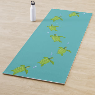 Tortues de mer vertes sur tapis de yoga turquoise 