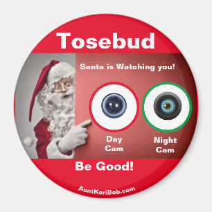 Tosebud Santa kijkt naar Magnet Magneet