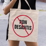 Tote Bag Anti Ron DeSantis Floride Démocrate Politique<br><div class="desc">Se dresser contre le gouverneur Ron DeSantis et ses politiques haineuses en Floride. Une bande rouge sur un sac fourre-tout Anti DeSantis.</div>