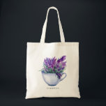 Tote Bag Aquarelle Lavande Fleurs dans Teacup Personnalisé<br><div class="desc">Sac fourre-tout floral blanc et botanique avec bouquet d'aquarelle de fleurs de lavande à l'intérieur d'un teacup. Personnalisez en ajoutant des noms ou des phrases courtes. Ce sac fourre-tout lavande sera parfait comme cadeau personnalisé.</div>
