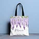 Tote Bag Aquarelle Wisteria Nom personnalisé<br><div class="desc">Ce design présente d'élégantes fleurs de glycine aquarelle en lavande douce et violet avec des feuilles verts sur un arrière - plan blanc avec votre nom ci-dessous en script violet élégant. Personnalisez en modifiant le texte dans la zone de texte. Conçu pour vous par Evco Studio www.zazzle.com/store/evcostudio #mariage #batmitzvah #party...</div>