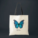 Tote Bag Belle aquarelle bleue 3D papillon<br><div class="desc">Créez vos propres sacs fourre-tout de papillons personnalisés sur un modèle do-it-yourself élégant qui est facile d'ajouter votre lettre monogramme, nom, initiales ou courte phrase/citation inspirante à. L'aquarelle rustique illustrée par les artistes Raphaela Wilson met en valeur un beau papillon monarque bleu avec une ombre sous ses ailes à motifs...</div>