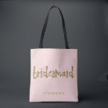 Tote Bag Bridesmaid Gold Parties scintillant Blush PInk<br><div class="desc">Ce sac fourre-tout Bridesmaid est parfait pour les demoiselles d'honneur très occupées à fourre-tout autour de tous leurs effets à la douche nuptiale ou l'événement principal. Ce sac fourre-tout rose vif présente un style de parties scintillant en faux or en lettrage sur le devant. Personnalisez ces totes avec le nom...</div>