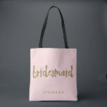 Tote Bag Bridesmaid Gold Parties scintillant Blush PInk<br><div class="desc">Ce sac fourre-tout Bridesmaid est parfait pour les demoiselles d'honneur très occupées à fourre-tout autour de tous leurs effets à la douche nuptiale ou l'événement principal. Ce sac fourre-tout rose vif présente un style de parties scintillant en faux or en lettrage sur le devant. Personnalisez ces totes avec le nom...</div>