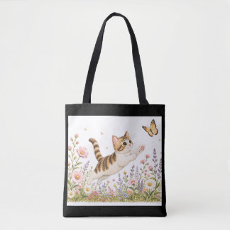 Tote Bag Chat brodé poursuivant un papillon dans une prairi