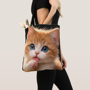 Tote Bag Chaton aux yeux bleus se léchant la patte