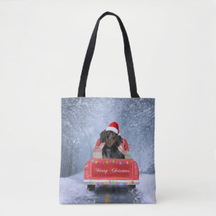 Tote Bag Chien de Dachshund en neige assis sur un camion de