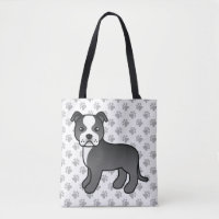 Chien Staffordshire Bull Terrier noir et blanc