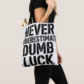 Tote Bag Citation "Ne jamais sous-estimer la chance idiote" (De près)