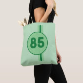 Tote Bag Conception 85 en vert sur fond vert menthe avec de (De près)