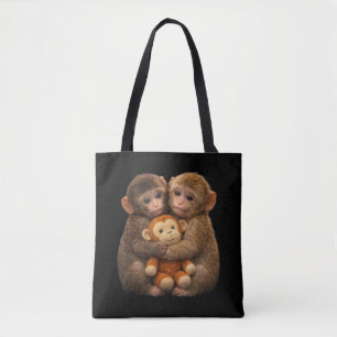 Tote Bag Couple de singes mignons étreignant une peluche Si