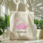 Tote Bag Dinosaure rose mignon Personnalisé<br><div class="desc">Le sac fourre-tout de cette fille est une jolie illustration d'un dinosaure rose aux cils longs. Personnalisez-le avec le nom de votre enfant en lettres noires. Ça fait un grand sac de livre !</div>