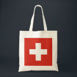 Tote Bag Drapeau Suisse - croix blanche<br><div class="desc">Le drapeau suisse est constitué d'un drapeau rouge avec une croix blanche au centre. Le drapeau suisse de couleur rouge est idéal pour les événements sportifs, le décor de maison, les restaurants, les bars et les voyages. Le texte peut être ajouté ou supprimé et les tailles peuvent être modifiées. #suisse...</div>