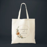 Tote Bag Elegant Copper & Earthy Botanical Wedding<br><div class="desc">Elegant Copper & Earthy Botanical Wedding Tote Bag with your names & date. Immerse yourselves in natural elegance with our Copper & Earthy Botanical Wedding napkins with your names & date. This sophisticated design captures the warmth and charm of a Boho-inspired wedding, featuring stunning copper and burnt orange florals beautifully...</div>