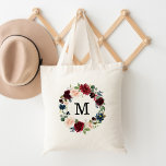 Tote Bag Élégant Monogramme de couronne florale et bordeaux<br><div class="desc">Améliorez votre jeu fourre-tout grâce à nos sacs fourre-tout floraux élégants et personnalisés. L'élégant sac fourre-tout est doté de votre monogramme personnalisé ou initial entouré d'une couronne de fleurs d'aquarelle bordeaux, roses rousses et bleu marine agrémentée d'un feuillage vert luxuriant. Les sacs fourre-tout de couronne fleurie sont parfaits pour la...</div>