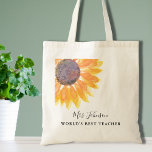 Tote Bag Enseignant Rustique de tournesol<br><div class="desc">Ce Sac fourre-tout fleuri rustique de l'enseignant est décoré d'un tournesol d'aquarelle dans les tons jaunes. Facile à personnaliser. Pour modifier davantage, utilisez l'outil de conception pour modifier la police, la taille de police ou la couleur. Parce que nous créons notre oeuvre, vous ne trouverez pas cette image exacte d'autres...</div>