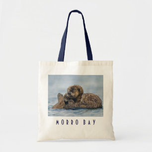 Tote Bag Équitation de loutre de mer de bébé sur la mèr