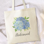 Tote Bag Fermeture de Bridesmaid Floral Blue Hydrangea<br><div class="desc">Ce sac fourre-tout de femme de chambre présente une hydrangée bleu aquarelle et un feuillage vert. Vous pouvez le personnaliser avec un nom. Visitez notre magasin ou nos pages de collection pour plus de produits présentant ce design que vous pouvez customiser pour vos besoins.</div>