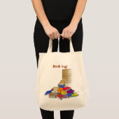 Tote Bag Garçon en bas âge entouré de livres. (Devant (produit))