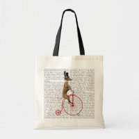 Greyhound sur Red Penny Farthing Bike